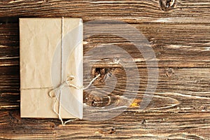 parcel wrapped with brown kraft paper and tied with twine