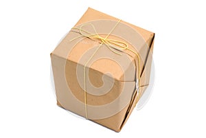 Parcel wrapped in brown paper and tied.