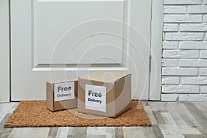 Parcels with stickers Free Delivery on rug. Courier service