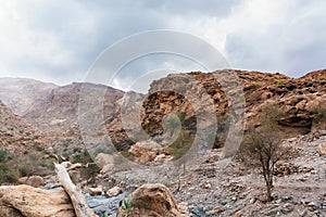 Parched riverbed called wadi in Asia, in the outskirts of Muscat, Oman