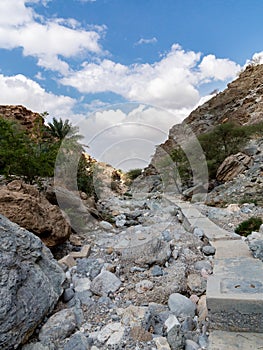 Parched riverbed called wadi in Asia, in the outskirts of Muscat, Oman