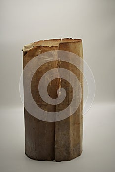 parchment in cylindrical shape. Old document from the s. xvi written in Catalan and Latin photo