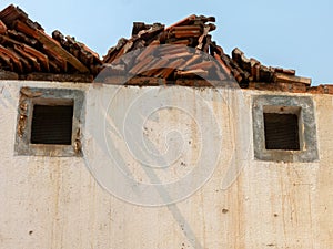 Pareidolia face house wall and windows photo