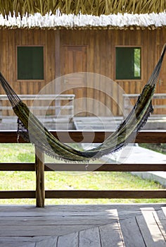Pareidolia of a smiley face with a hammock and two windows photo