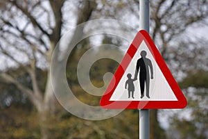 Parent and child road safety sign