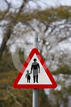 Parent and child road safety sign