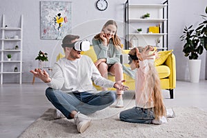 Parent and daughter playing in virtual