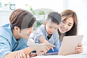 Parent play laptop with child
