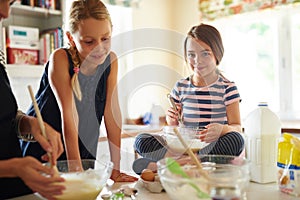 Parent, portrait or happy kids baking in kitchen as a family with siblings learning cookies recipe at home. Girl