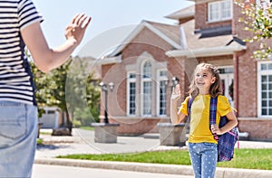 Parent and pupil go to school