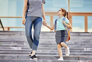 Parent and pupil go to school