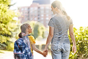 Parent and pupil go to school photo