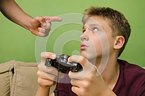 Parent schooling his kid not to play video games.