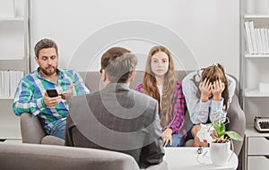 Parental concept. Parents telling the psychologist about family or child problems.