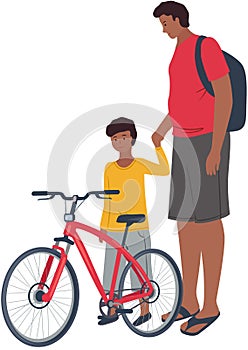 Parenting. Father teaches his son to ride bicycle. First bike dad with his child spend time together