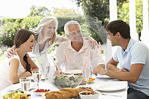 Parents and Adult Children enjoying Al Fresco Meal