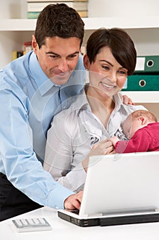 Parents With Baby Working From Home