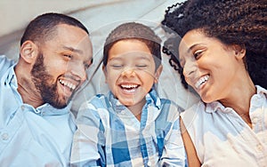 Parents, child and smile in bed for happy closeup together to relax together at family home. Mother, dad and kid