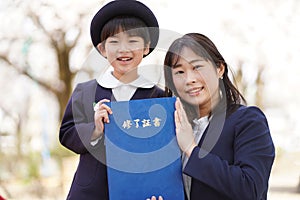 Parents and children with diplomas