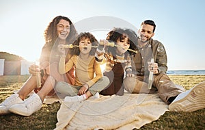 Parents, children and fun bubbles at picnic at beach vacation home with smile, love and relax. Mom, dad and kids on