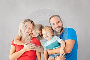 Parents with children having fun at home