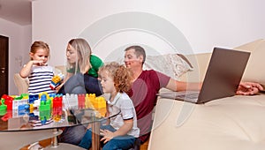 Parents with children having fun and playing together