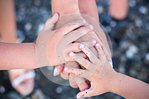 Parents and children holding hands