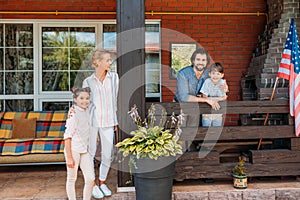 parents and children standing on country