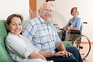 Parents and daughter in wheelchair