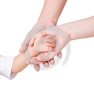 Parents dragging baby's hand on white background