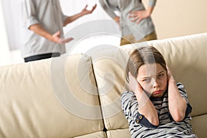 Parents fighting in front of their daughter photo