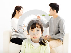 Parents fighting and little girl being upset