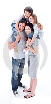 Parents giving their children piggyback ride