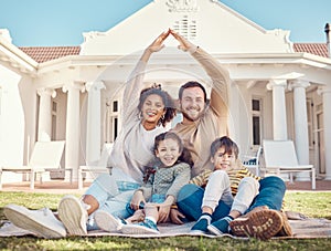 Parents, hands together and protection with children, relax on lawn and happiness in portrait while at home. Safety