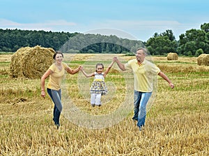 Parents having fun with daughter