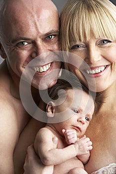 Parents Holding Newborn Baby