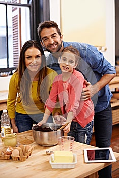 Parents, kid and baking with tablet for recipe online with ingredients for cake or dessert with support and handmade