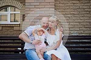 Parents and kid having fun spending time