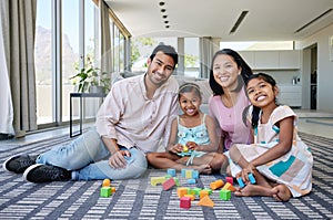 Parents, kids and play with building blocks in living room for game, learning and creative fun for development at house