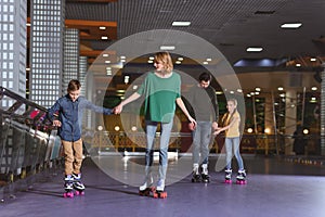 parents and kids skating on roller