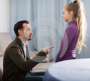 Parents lecturing daughter