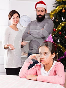 Parents lecturing daughter at Christmas