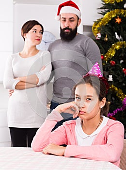 Parents lecturing daughter at Christmas