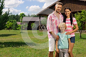 Parents loving their son spending weekend in the garden