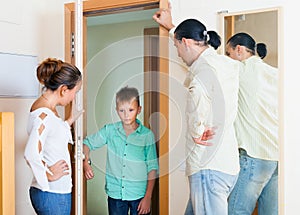 Parents meeting with scold of teenage son