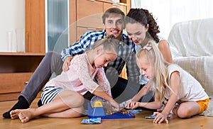 Parents playing lotto with kids
