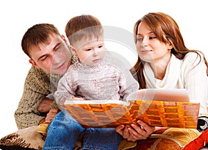 Parents reading to their kid