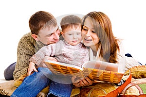 Parents reading to their kid