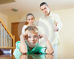 Parents scolding teenager son