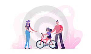 Parents Teaching Child Riding Bicycle in City Park. Happy Family Having Outdoors Activity Spending Time Together on Street